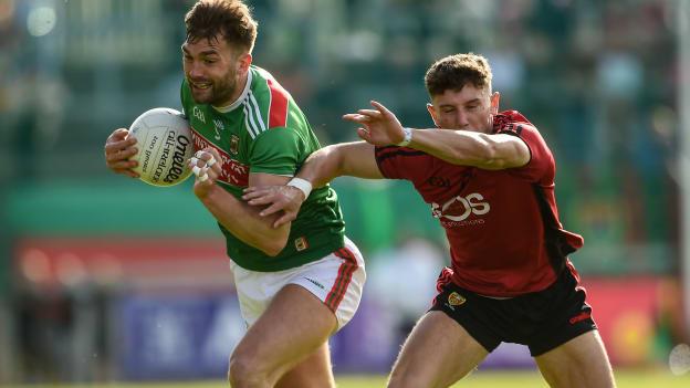 Aidan O'Shea of Mayo in action against Pierce Laverty of Down during the GAA Football All-Ireland Senior Championship Round 2 match between Down and Mayo at Pairc Esler in Newry, Down. 