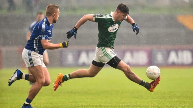 Daire O'Baoill of Gaoth Dobhair in action against Jamie McCarey of Scotstown during the AIB Ulster GAA Football Senior Club Championship Final.