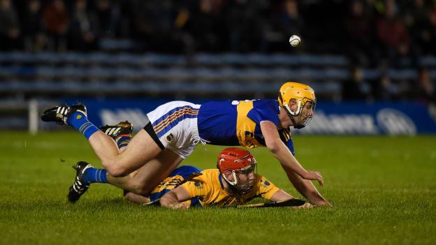 Barry Heffernan, Tipperary, and Niall Deasy, Clare, collide at Semple Stadium.