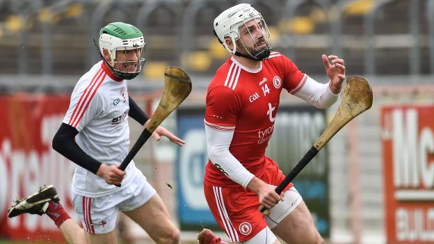 Damien Casey of Tyrone bursts clear of Mike Lyons of Louth during the Allianz Hurling League Division 3A Round 2 match between Tyrone and Louth at Healy Park in Omagh, Tyrone. 