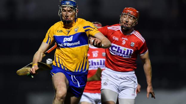 David Fitzgerald, Clare, and Bill Cooper, Cork, in Allianz Hurling League action at Pairc Ui Rinn.