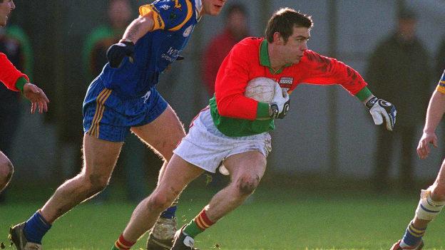 Andrew Corden in action against Wicklow's Adrian Foley in the 2002 O'Byrne Cup Final. 