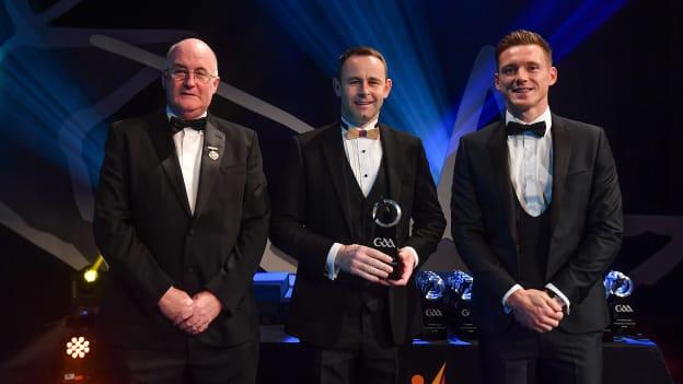 Declan Molloy is presented with his Nicky Rackard Champion 15 Award by Uachtarán Chumann Lúthchleas Gael John Horan and GPA CEO Paul Flynn during the 2018 PwC GAA All Stars.