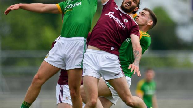 Alan Molloy of Galway in action against Robin Clarke, left, and Sean Claire of Meath during the GAA Football All-Ireland Junior Championship semi-final match between Meath and Galway at Dr Hyde Park in Roscommon. 