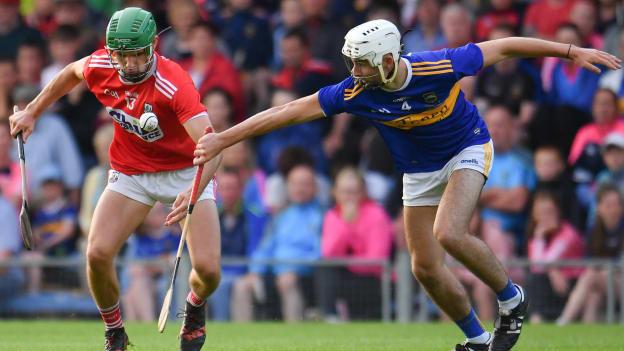 Brian Turnbull of Cork in action against Craig Morgan of Tipperary during the Bord Gais Energy Munster GAA Hurling Under 20 Championship Final match between Tipperary and Cork at Semple Stadium in Thurles, Co Tipperary.