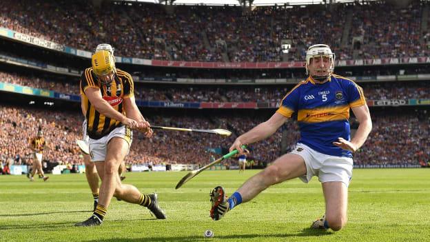 Séamus Kennedy of Tipperary blocks the shot of Colin Fennelly of Kilkenny late in the 2016 GAA Hurling All-Ireland Senior Championship Final match between Kilkenny and Tipperary at Croke Park in Dublin. 