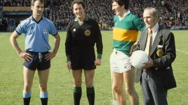 Referee Hugh Duggan with Dublin captain Tony Hanahoe and Kerry captain Tim Kennelly and Frank Hughes, right, holding the match ball before the start of the game.