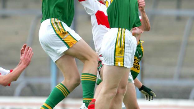 David Moran and Tommy Walsh contest a high ball with Mayo's Tom Parsons in the 2006 All-Ireland Minor Football Quarter-Final. 