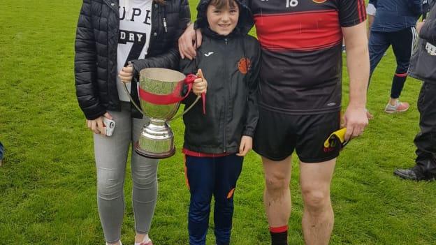 Colin Kelly celebrates with his daughter Tara and son Conal after helping Dreadnots to victory over Naomh Mairtin in the Louth Junior 2B Football Championship Final. 