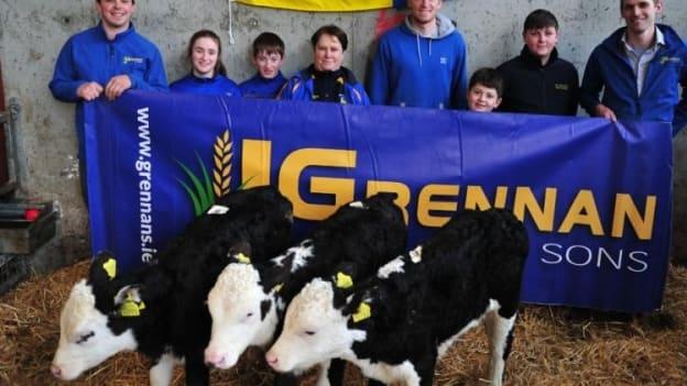 Colin Anderson and John Kelly of J Grennan and Sons Animal Feeds, Birr, sponsors of Calf Milk Replacer for Carrickedmond GAA Club's unique fundraiser,  pictured with club officials and supporters.