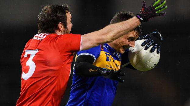 Conor Sweeney, Tipperary, and James Loughrey, Cork, in Allianz Football League Division Three action at Semple Stadium.