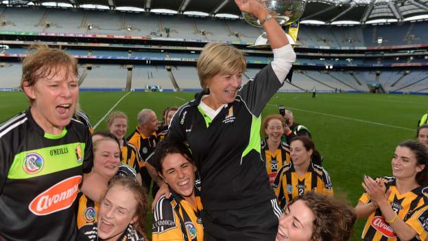 Ann Downey (right) and her sister Angela are carried shoulder-high off the Croke Park pitch by the Kilkenny camogie players after their 2016 All-Ireland Final win. 