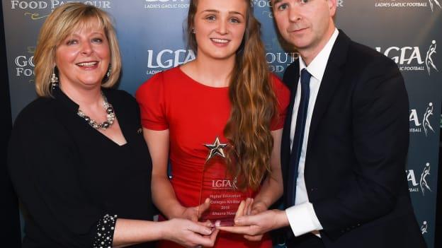 Shauna Howley of University of Limerick receiving her 2018 Gourmet Food Parlour O’Connor Cup All Star Award from Marie Hickey, President of the LGFA, and Donal Barry, Chairperson Ladies HEC, at the Croke Park Hotel.