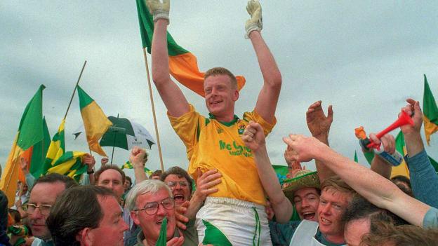 Leitrim captain, Declan Darcy, is lifted shoulder-high by jubilant Leitrim supporters after the 1994 Connacht SFC Final. 