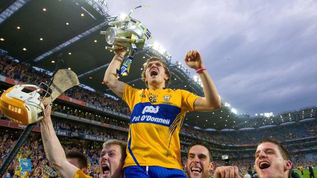 Shane O'Donnell celebrates with his team-mates and the Liam MacCarthy Cup in front of Hill 16 after victory over Cork in the 2013 All-Ireland SHC Final replay. 