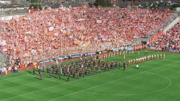 The Tyrone and Armagh teams parade in front of Hill 16 before the 2003 All-Ireland SFC Final. 
