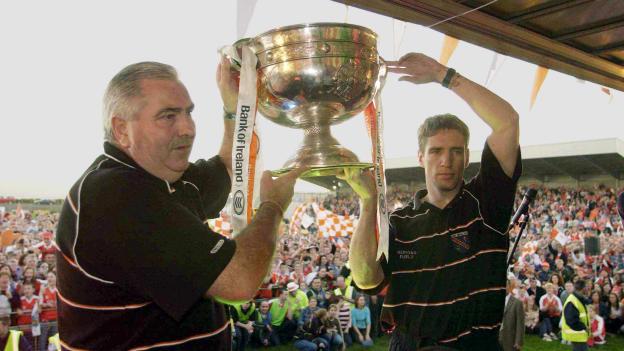 Joe Kernan and Kieran McGeeney pictured with the Sam Maguire Cup in 2002.