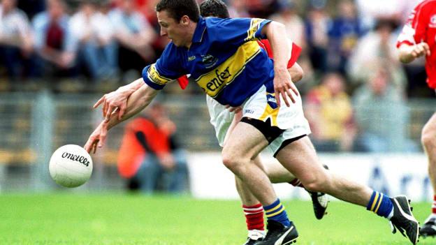 Tipperary's star forward, Declan Browne, in action against Cork's Graham Canty in the 2002 Munster SFC Final. 