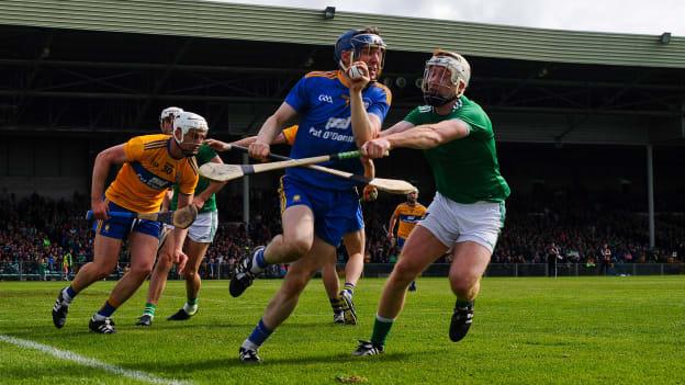 Donal Tuohy, Clare, and Cian Lynch, Limerick, in Munster Senior Hurling Championship action last year.
