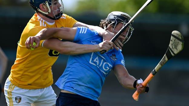 Cian Boland of Dublin is tackled by Gerard Walsh of Antrim during the Allianz Hurling League Division 1 Round 3 match between Dublin and Antrim in Parnell Park in Dublin. 