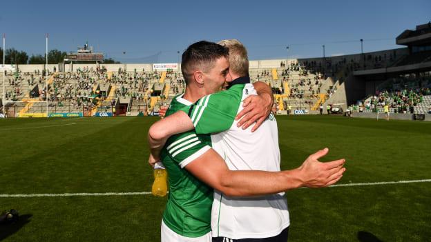 Seán Finn and Limerick manager John Kiely celebrate after the Munster GAA Hurling Senior Championship Final match between Limerick and Tipperary at Páirc Uí Chaoimh in Cork.