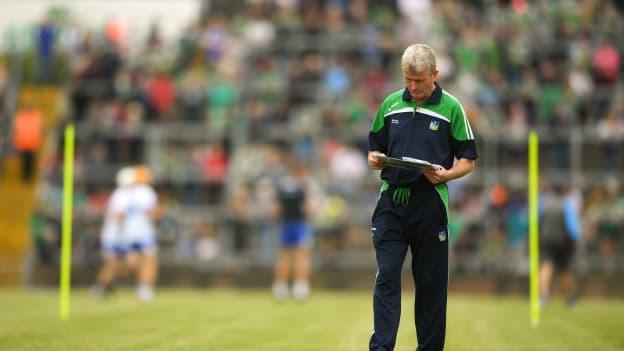 Limerick manager John Kiely studies the programme prior to the Munster GAA Hurling Senior Championship Round 4 match between Limerick and Waterford at the Gaelic Grounds in Limerick.