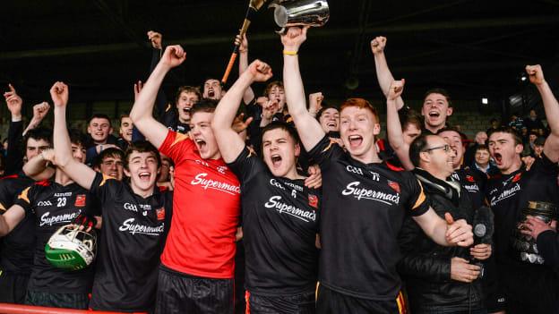 Ard Scoil Ris captain Cian Lynch lifts the cup after victory over Scoil na Trionoide Naofa in the 2014 Dr. Harty Cup Final.