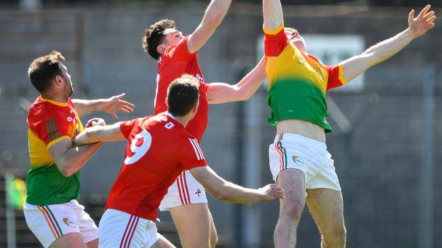 Liam Brennan, Carlow, and Conor Early, Louth in Leinster SFC action.