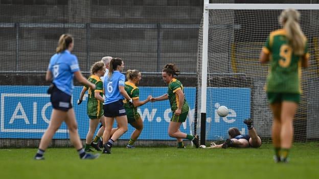 Emma Duggan of Meath, centre, celebrates after scoring her side's first goal during the TG4 Leinster Senior Ladies Football Championship Round 2 match between Dublin and Meath at Parnell Park in Dublin. 