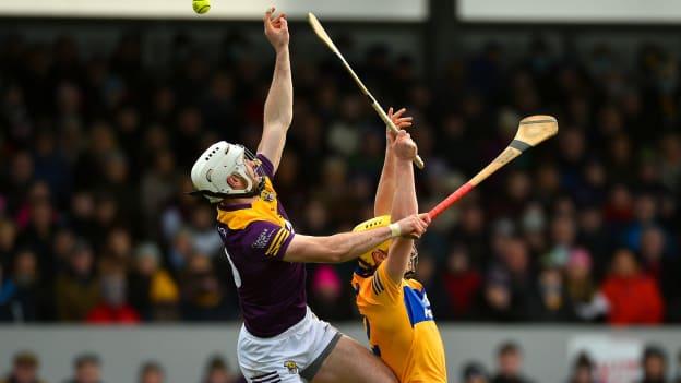 Oisín Foley of Wexford in action against Rory Hayes of Clare during the 2022 Allianz Hurling League Division 1 Group A match between Clare and Wexford at Cusack Park in Ennis, Clare.