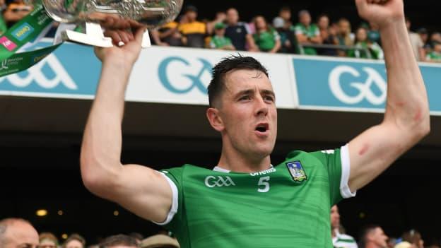 Diarmaid Byrnes of Limerick lifts the Liam MacCarthy cup after the 2022 GAA Hurling All-Ireland Senior Championship Final match between Kilkenny and Limerick at Croke Park in Dublin.