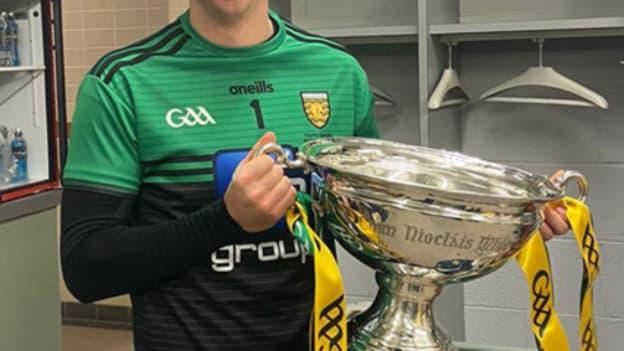Donegal goalkeeper and Carndonagh CS teacher, Luke White, pictured with the Nickey Rackard Cup after victory over Mayo in the 2020 Final. 