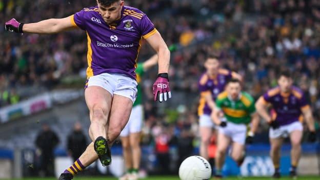 Shane Walsh of Kilmacud Crokes converts a penalty during the AIB GAA Football All-Ireland Senior Club Championship Final match between Watty Graham's Glen of Derry and Kilmacud Crokes of Dublin at Croke Park in Dublin.