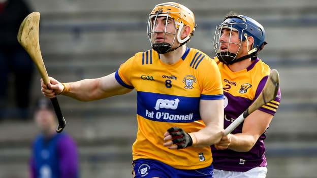 David Fitzgerald of Clare is tackled by Shane Reck of Wexford during the Allianz Hurling League Division 1 Group A match between Wexford and Clare at Chadwicks Wexford Park in Wexford. 