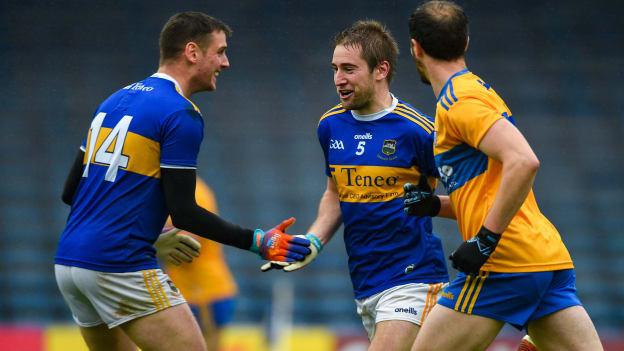 Bill Maher of Tipperary, right, celebrates with team-mate Conor Sweeney after scoring his side's second goal during the Munster GAA Football Senior Championship Quarter-Final match between Tipperary and Clare at Semple Stadium in Thurles, Tipperary. 