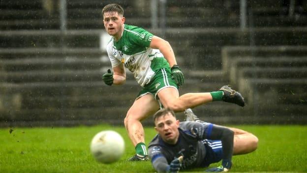 Tommy Keogh, Baltinglass, and St Patrick's goalkeeper, Shane Doyle in Wicklow SFC Final action.