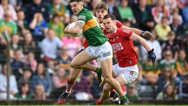 Tony Brosnan of Kerry in action against Maurice Shanley, right, and Ian Maguire of Cork during the Munster GAA Football Senior Championship Semi-Final match between Cork and Kerry at Páirc Ui Rinn in Cork.