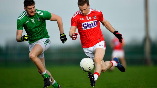 Matthew Taylor, Cork, and Brian Fanning, Limerick, in McGrath Cup action at Rathkeale.