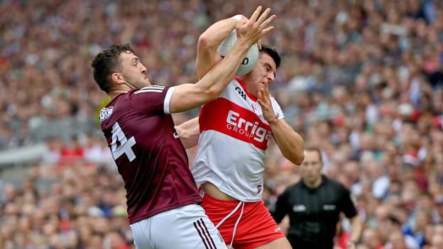 Damien Comer, Galway, and Conor Doherty, Derry, during the All Ireland SFC semi-final at Croke Park.