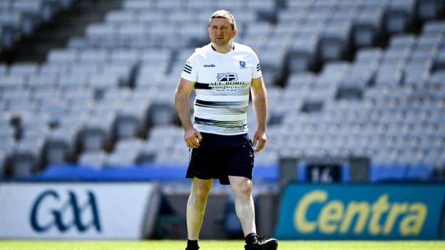 Monaghan manager Arthur Hughes patrols the turf in Croke Park before the Lory Meagher Cup final between Monaghan and Lancashire yesterday. 