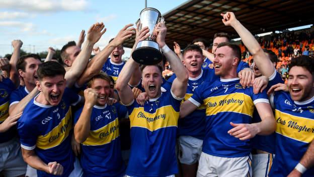 David Lavery of Maghery Seán MacDiarmada, centre, lifts the cup and celebrates with team-mates following the Armagh County Senior Football Championship Final match between Crossmaglen Rangers and Maghery Seán MacDiarmada at the Athletic Grounds in Armagh. 