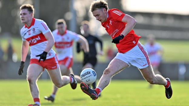 Leonard Grey, Louth, and Ethan Doherty, Derry, in Allianz Football League Division Two action. Photo by Stephen Marken/Sportsfile