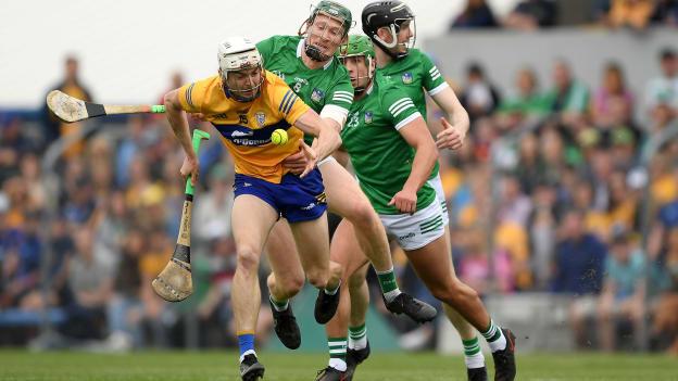 Ryan Taylor of Clare is tackled by William O'Donogue of Limerick during the Munster GAA Hurling Senior Championship Round 4 match between Clare and Limerick at Cusack Park in Ennis, Clare. 