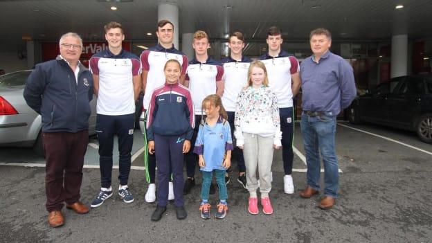 Vice Chairman John Daly and Anthony Finnety pictured with the five Salthill-Knocknacarra players on the Galway minor panel.