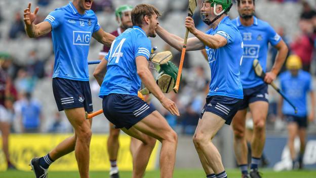 Dublin players, from left, Chris Crummey, Ronan Hayes and Fergal Whitely celebrate after their side's victory over Galway in their Leinster GAA Hurling Senior Championship Semi-Final match at Croke Park in Dublin. 