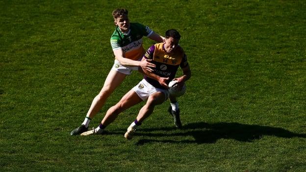 Eoghan Nolan, Wexford, and Johnny Moloney, Offaly, in Leinster SFC action.