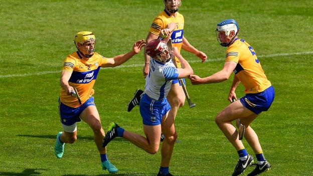 Calum Lyons of Waterford under pressure from three Clare players, Rory Hayes , 2, Tony Kelly, 9, and Diarmuid Ryan, during the Munster GAA Hurling Senior Championship Quarter-Final match between Waterford and Clare at Semple Stadium in Thurles, Tipperary. 