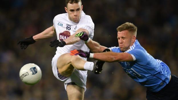 Cathal McNally of Kildare has his shot blocked down by Jonny Cooper of Dublin during the 2018 Allianz Football League Division 1 Round 1 match between Dublin and Kildare at Croke Park 