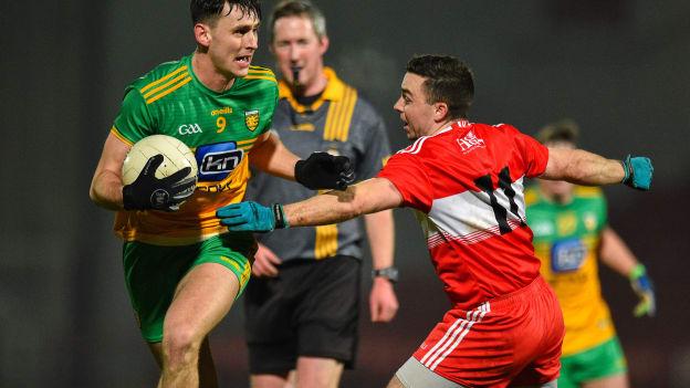 Michael Langan of Donegal in action against Niall Toner of Derry during the Bank of Ireland Dr McKenna Cup Round 3 match between Derry and Donegal at Celtic Park in Derry.