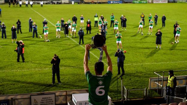 Limerick captain Declan Hannon lifts the cup in front of his team-mates in an empty stadium after the Munster GAA Hurling Senior Championship Final match between Limerick and Waterford at Semple Stadium in Thurles, Tipperary. 